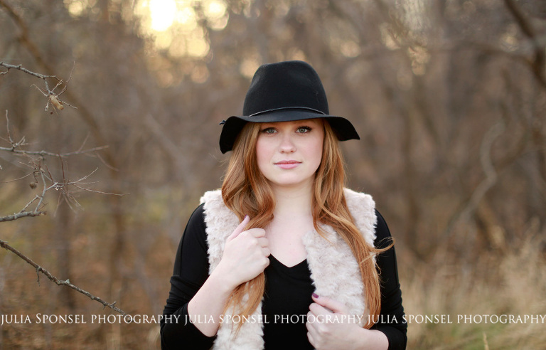 frisco senior photographer outdoors wearing a hat