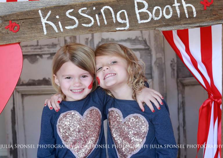 twin-sisters-kissing-booth